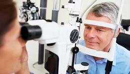 Older man undergoing an eye exam